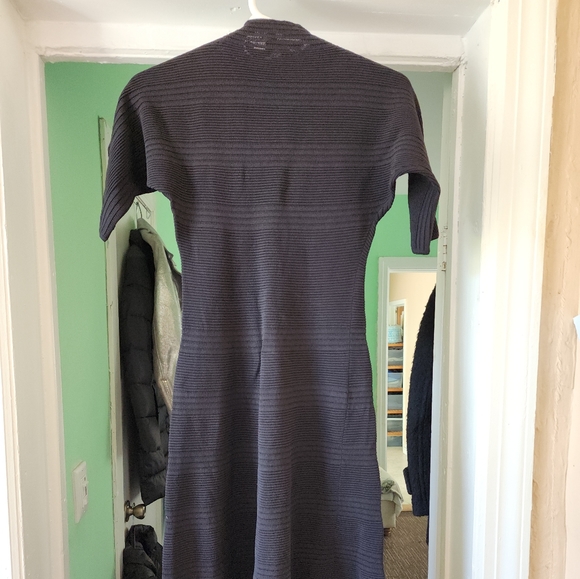 Adolfo Dominguez is a black sophisticated dress. - Picture 8 of 8